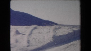 1958: Traveling on the Highway Through Barren Land on Both Sides and Reaching a