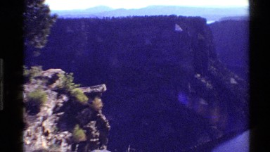 1980: The View From A Clifftop Of Mountains, Sky And A Meandering River Western