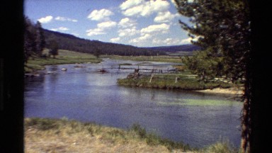 1980: river with meadows adjacent and grassy banks WESTERN USA