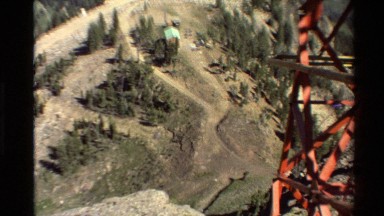1980: riding on a lift looking down at the land below WESTERN USA