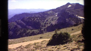 1980: arid environment with hills and mountains, valley and a river in the