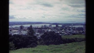 1981: Short Video of Beautiful City with Skyscrapers Surrounded by Body of Water