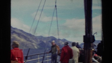 1982: peoples in a boat at the lake,enjoy the nature season NEW ZEALAND