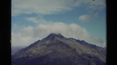 1982: a mountain range being viewed by a boat NEW ZEALAND