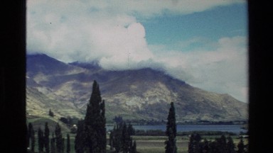 1982: natural view from mountain,captures the lake,sky,trees by a camcorder