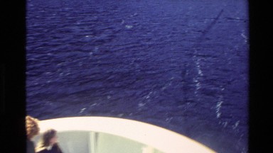 1982: Large Boat; Wildlife Floating in the Sea; Very Tall Mountain with a Long Waterfall