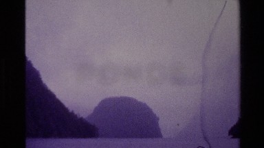 1982: nature footage of foggy islands a waterfall and a river. NEW ZEALAND
