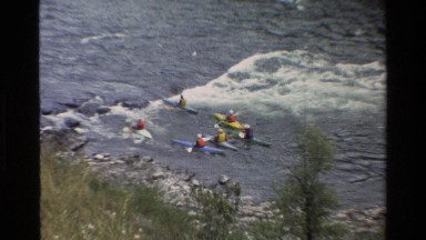 1980: people rowing opposite direction GRAND TETON WYOMING