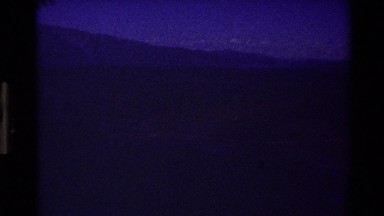 1980: panorama of a mountain valley with trees, a wide valley, and mountain