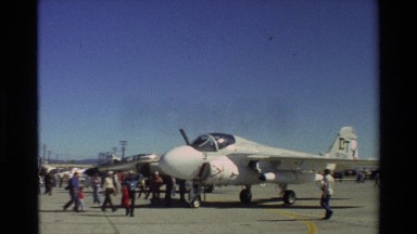 1981: Display of Old Aeroplanes on an Airfield with Spectators Watching
