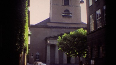 1982: Panning Shot from Base of Church Up to Tower Denmark