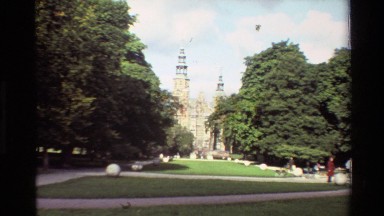 1982: A Slowly Zooming View of a Large Building from the Front Gardens, Flanked