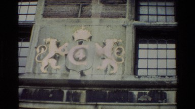 1982: Twin Lion Crest on Wall, Soldiers Walking Down Road Denmark