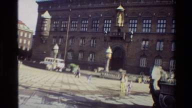 1982: public area with old european architecture style building with clock tower