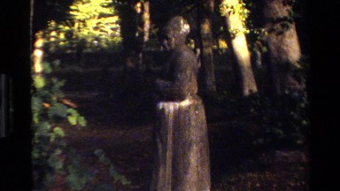 1982: old stone statues in a forest DENMARK
