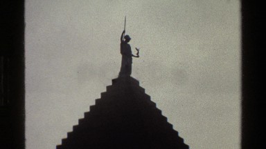 1983: person panning top to bottom of a landmark building. DENMARK