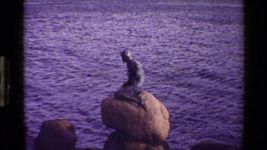 1983: A Statue on the Rock of a Lake, Denmark