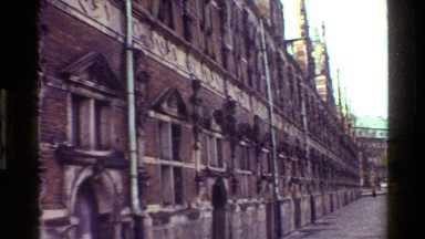 1983: long street building decorated with some bust lady statue DENMARK