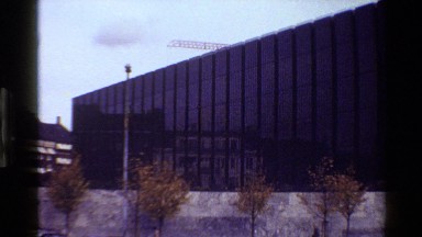 1983: a construction site with a crane on top. DENMARK