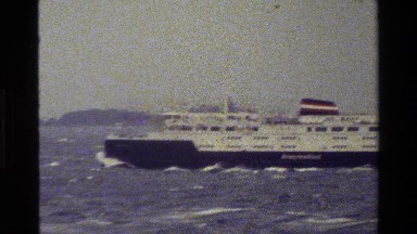 1983: ocean liner moving along rough seas DENMARK