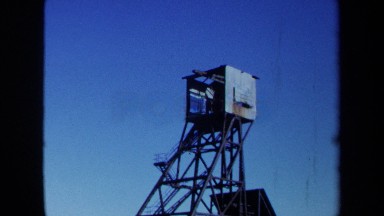 1971: women comes out house to see if food mill is running MAINE