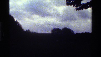 1983: a landscape in eerily dark colors with mill DENMARK