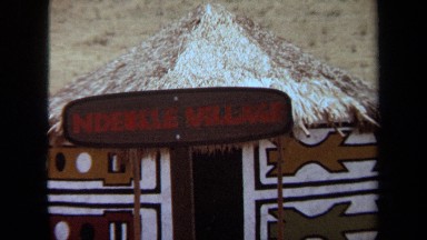 1971: a hut with a sign reading ndebele village LAGUNA HILLS CALIFORNIA