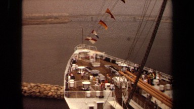 1971: people walking around ship in water LONG BEACH CALIFORNIA