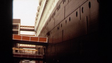 1971: a large ship is at a dock LONG BEACH CALIFORNIA
