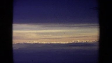 1970: Looking Out Airplane Window at Clouds and Wing California