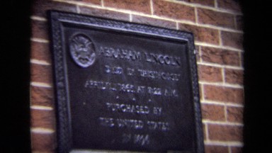 1970: zooming in on an official plaque on a wall that has a memorial for abraham
