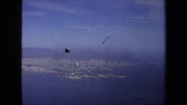 1970: bridge over the ocean connects populous area to more natural, undeveloped