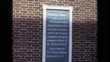 1970: sign: cornell street; clip of a block with buildings WASHINGTON DC