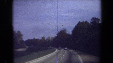 1970: Cars Driving Down Concrete Road in Washington DC