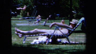 1961: Several People of All Ages Resting and Playing in a Park California