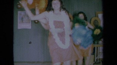 1961: Three Pretty Ladies in Hawaiian Leis Dance in a Group California