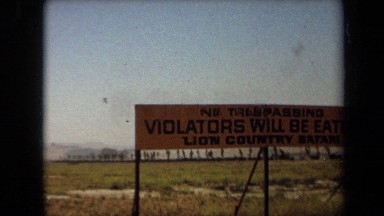1971: Sign No Trespassing Violators Will Be Eaten Lion Country Safari Laguna Hills California