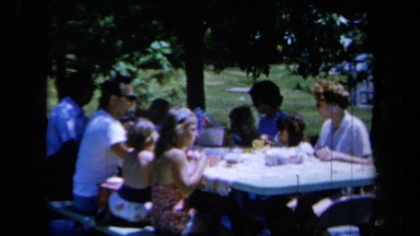 1961: A Family Having a Birthday Party Under a Tree on a Sunny Day in California