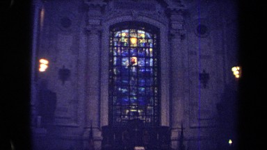1970: Picture of Jesus in Front of Clouds and Beneath Candles in the Window