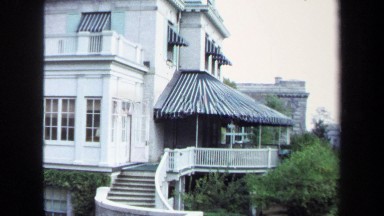1970: A Large Striped Awning Sits Over a Spacious Porch in Annapolis