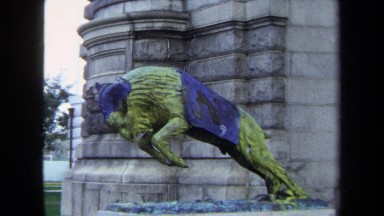 1970: a beautiful statue of a bull ready to launch an attack on the matador