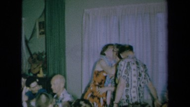 1961: Friends Receiving Beautiful Flower Necklaces in California