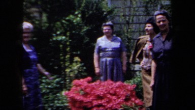 1958: A Group of Ladies Standing Outside New York