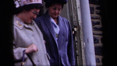 1958: Two Older Women Leave Church Arm in Arm in New York