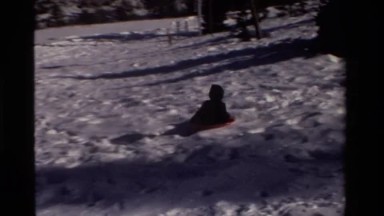 1981: Child Sledding in Snowy California