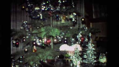 1981: Christmas Tree Loaded with Tinsel in Living Room with Presents