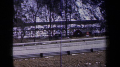 1959: A Large Area Covered with Water and Vehicles Moving in New York
