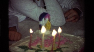 1981: Party of Children Gathered Around Table Enjoying Special Day of Birthday