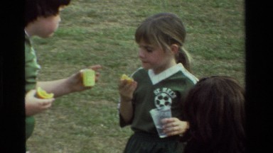 1981: Two Children with Parents and Elderly Enjoying Picnic California