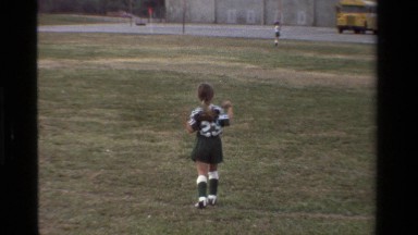 1981: A Little Kid Jumping in the Grass, California